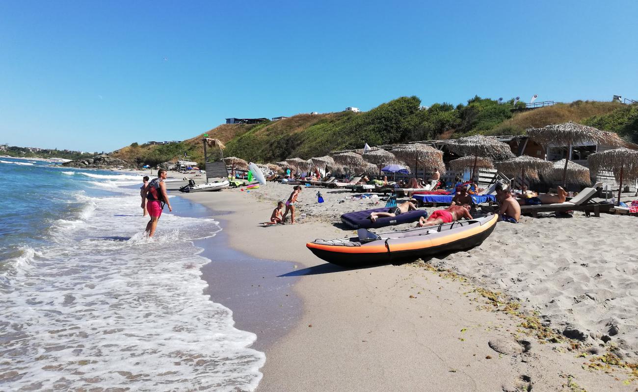 Photo de Dolphin Nude beach avec sable blanc de surface