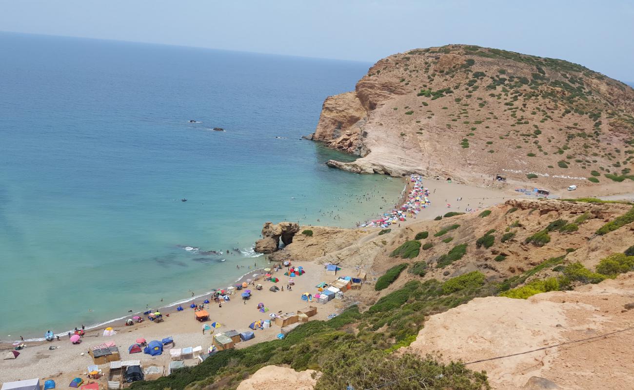 Photo de Ourdania Plage avec sable beige & galets de surface