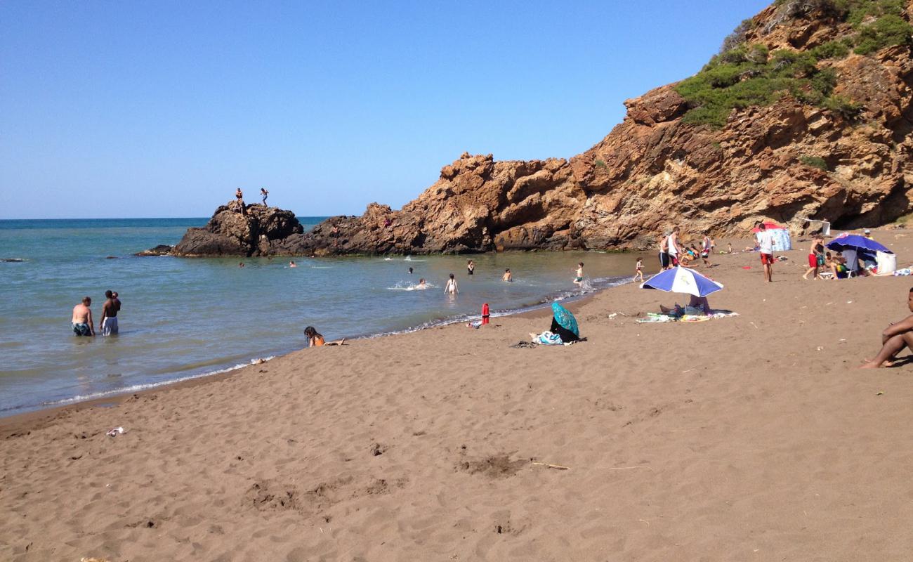 Photo de Plage Sidi Brahim avec sable brun de surface