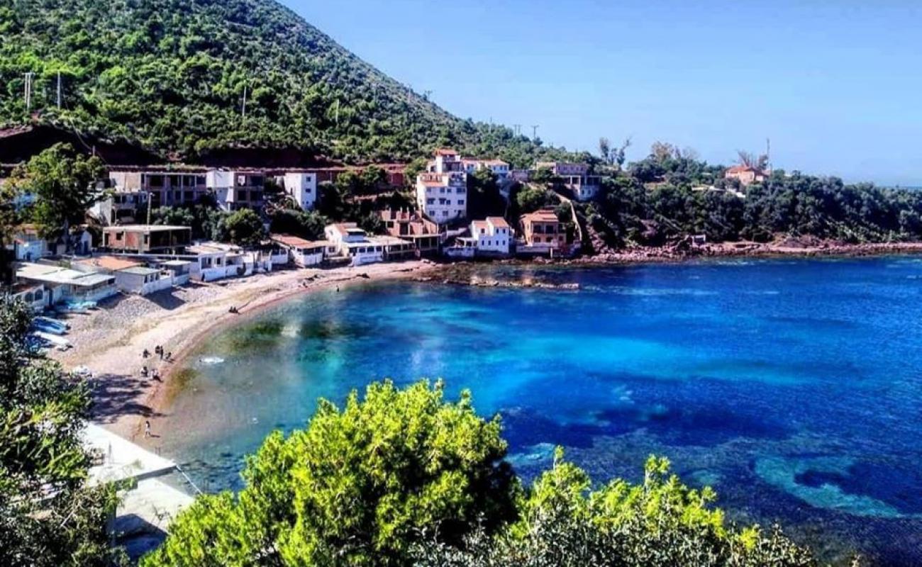 Photo de Carroubier Beach avec terrain rocheux de surface