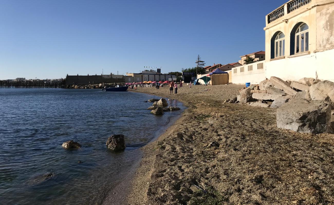 Photo de La Cigogne beach avec petits galets beige de surface
