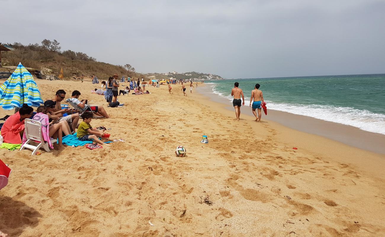 Photo de Deca plage avec sable fin et lumineux de surface