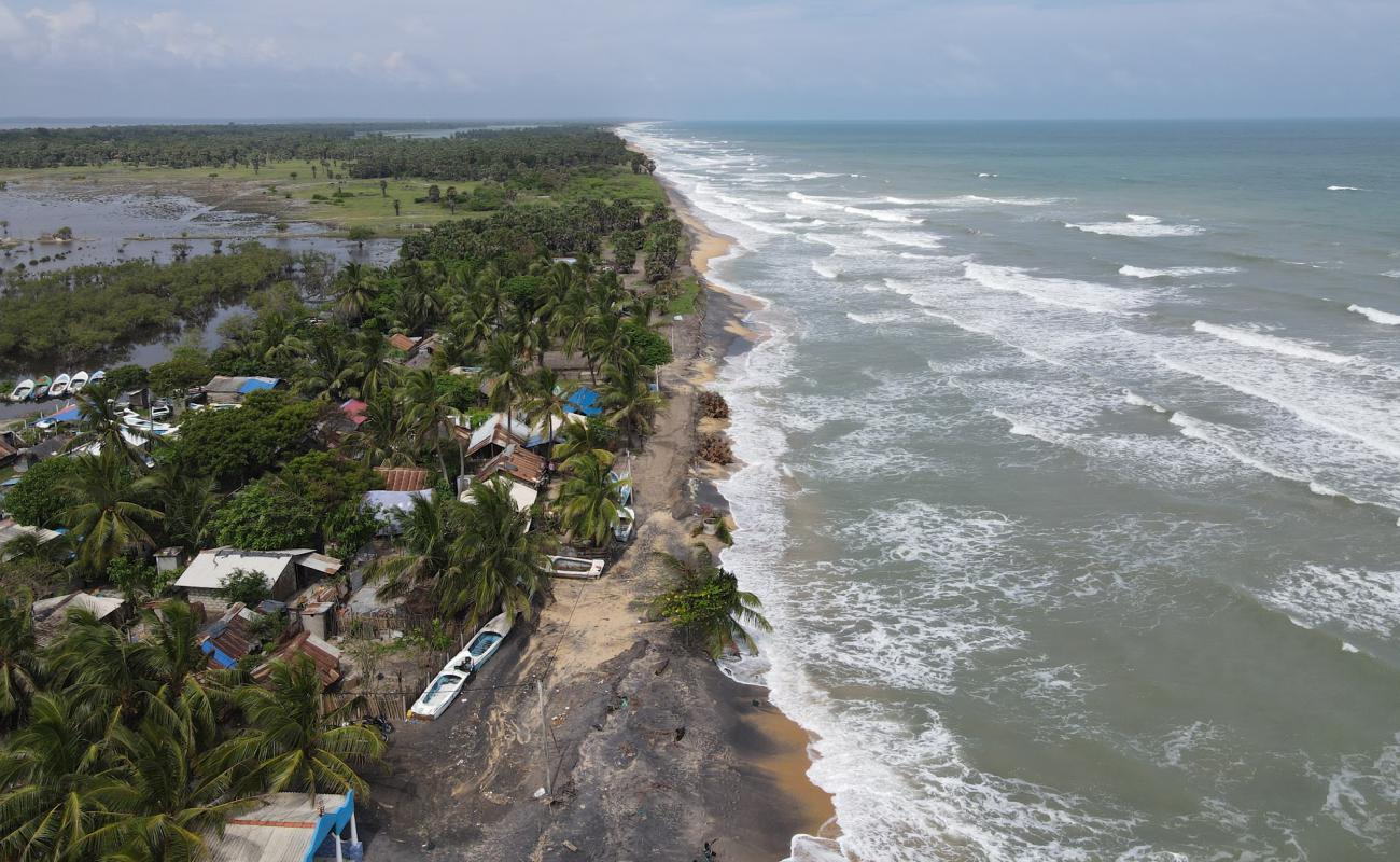 Photo de Black Sand Beach avec sable noir de surface