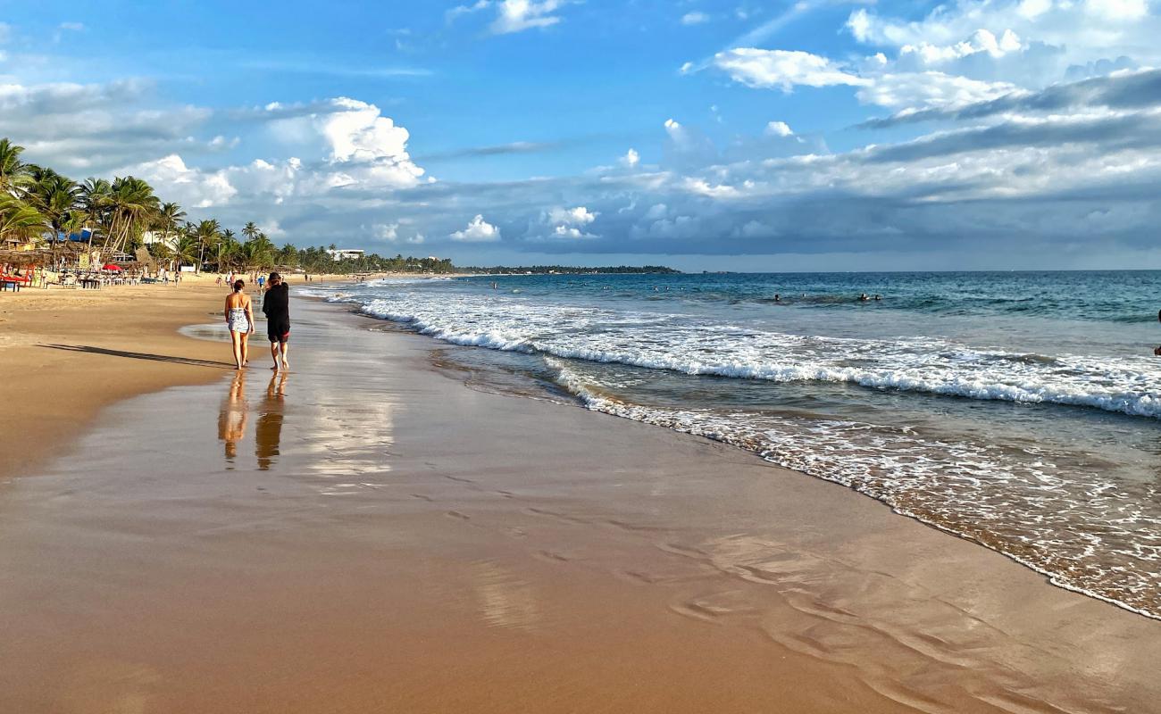 Photo de Narigama Beach avec sable lumineux de surface