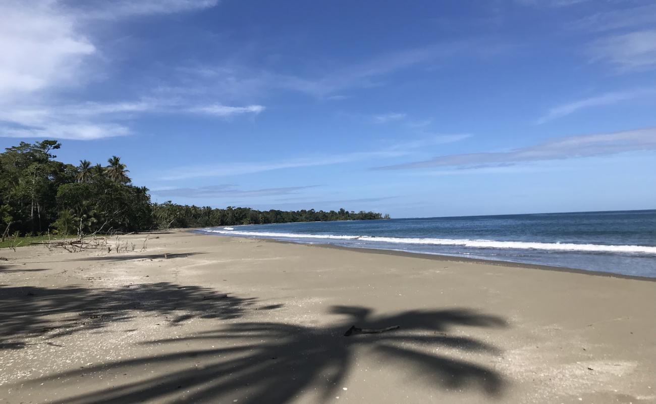 Photo de Puerto Vargas avec sable beige de surface