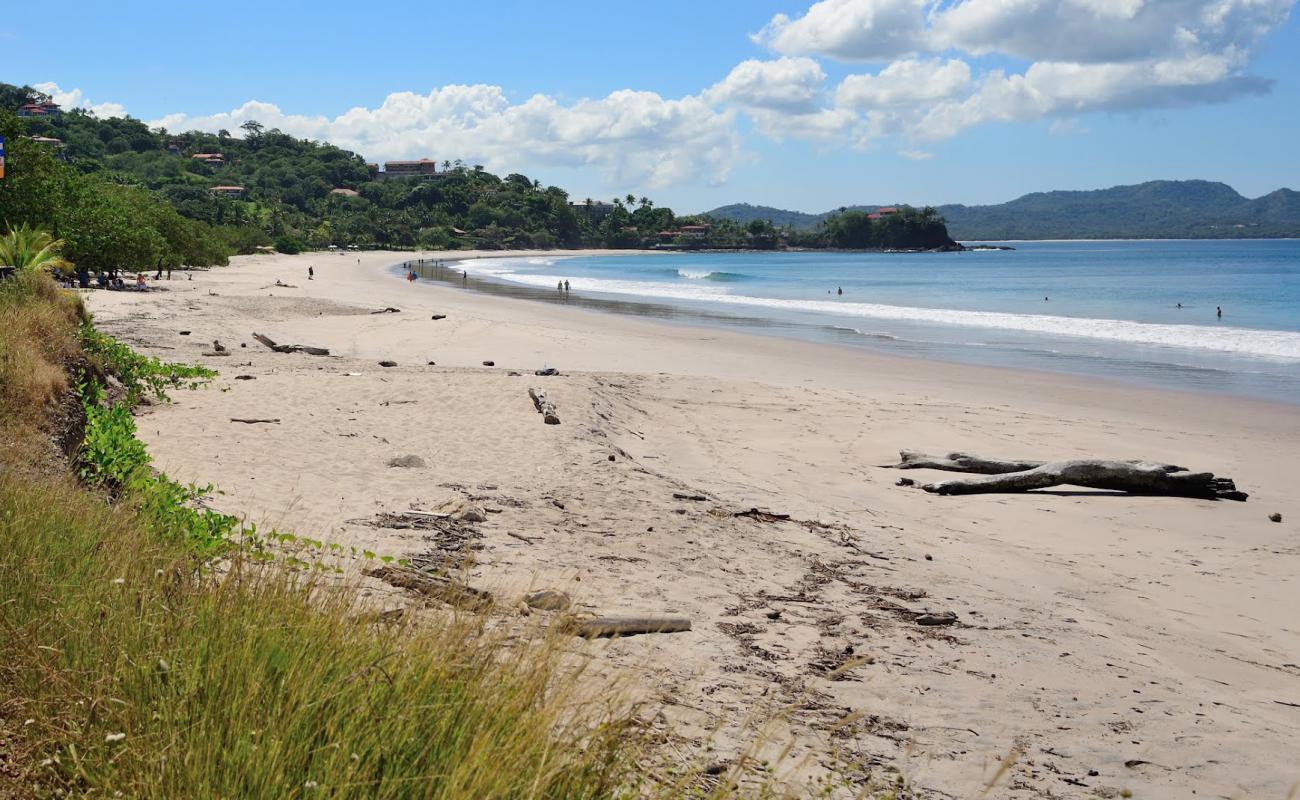Photo de Flamingo Beach avec sable beige de surface