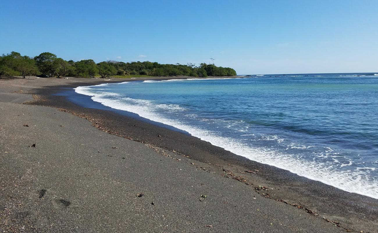 Photo de Frijolar Beach avec sable gris avec roches de surface