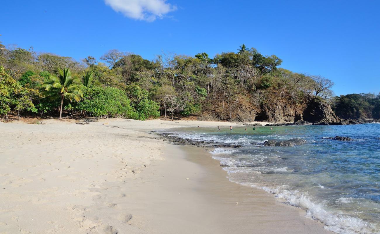 Photo de San Juanillo Beach avec sable lumineux de surface