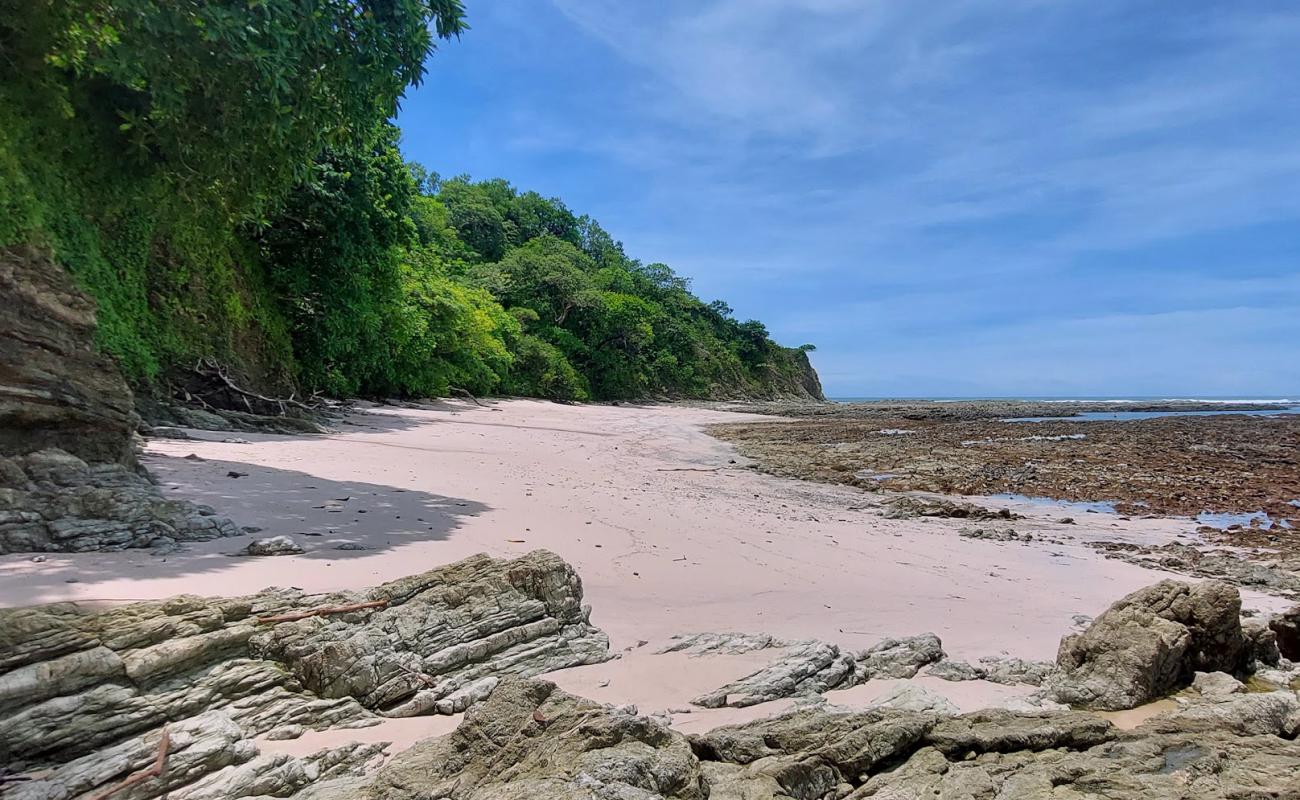 Photo de Playa Rosada avec sable beige & pierres de surface
