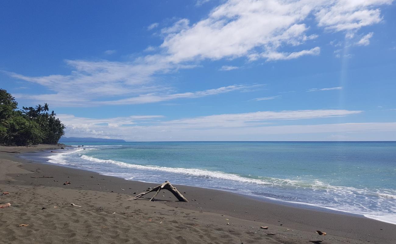 Photo de Playa Paraiso avec sable brun de surface