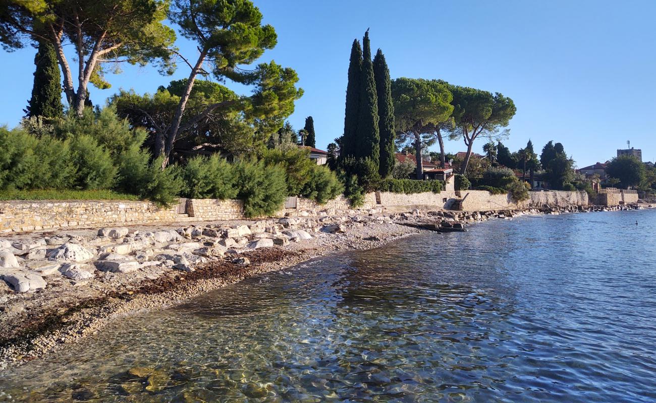 Photo de Dajla beach avec sable beige & galets de surface