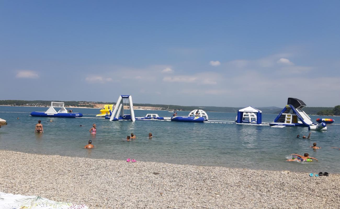 Photo de Lanterna beach avec sable beige de surface