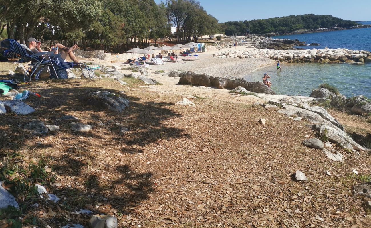Photo de Funtana beach II avec galets beige de surface