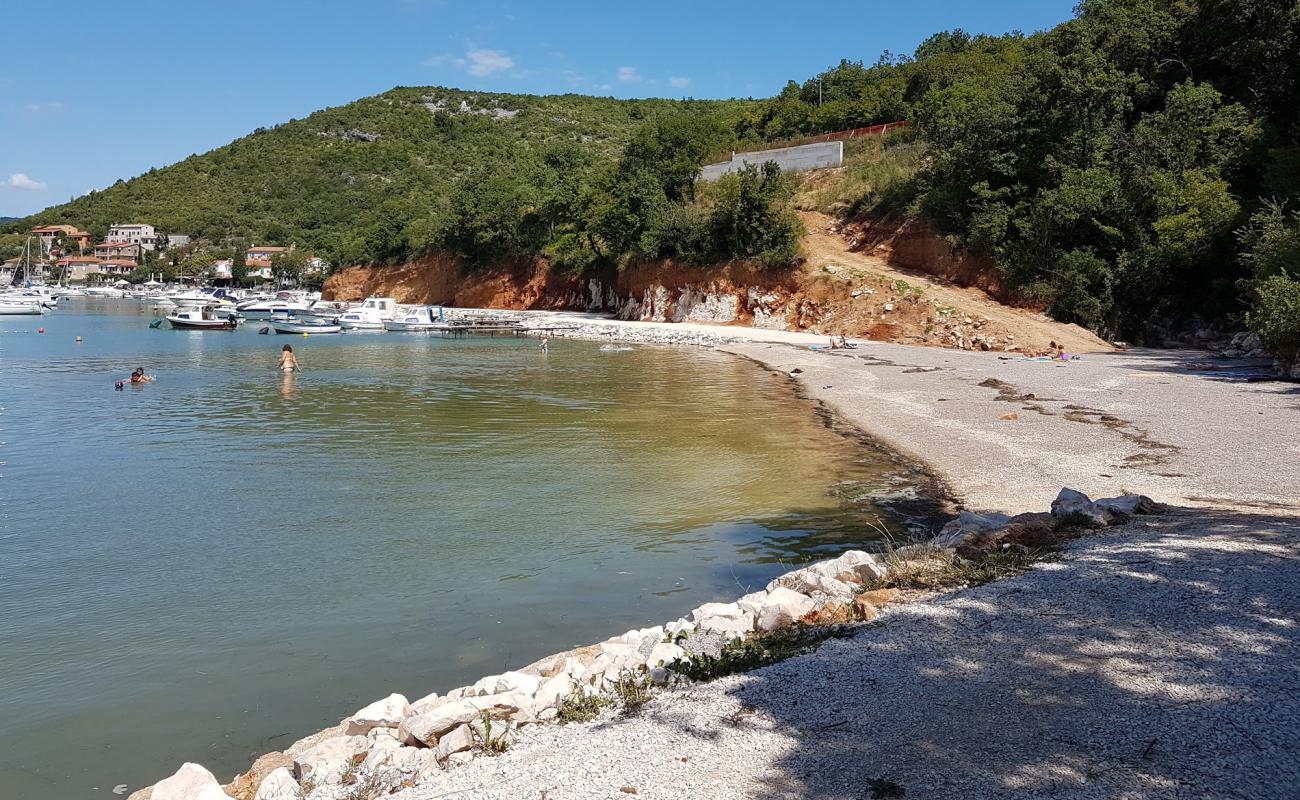 Photo de Get beach avec caillou fin brun de surface