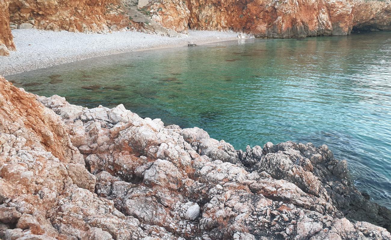 Photo de Povile beach II avec galets beige de surface