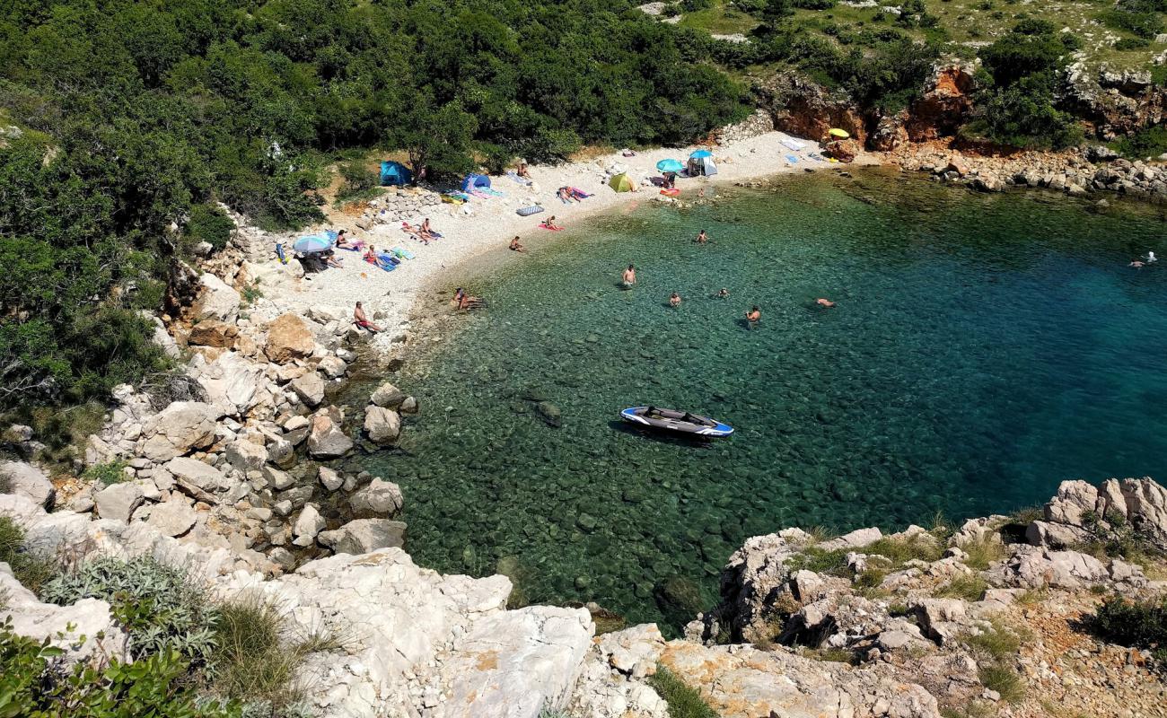 Photo de Dugno beach avec galets beige de surface