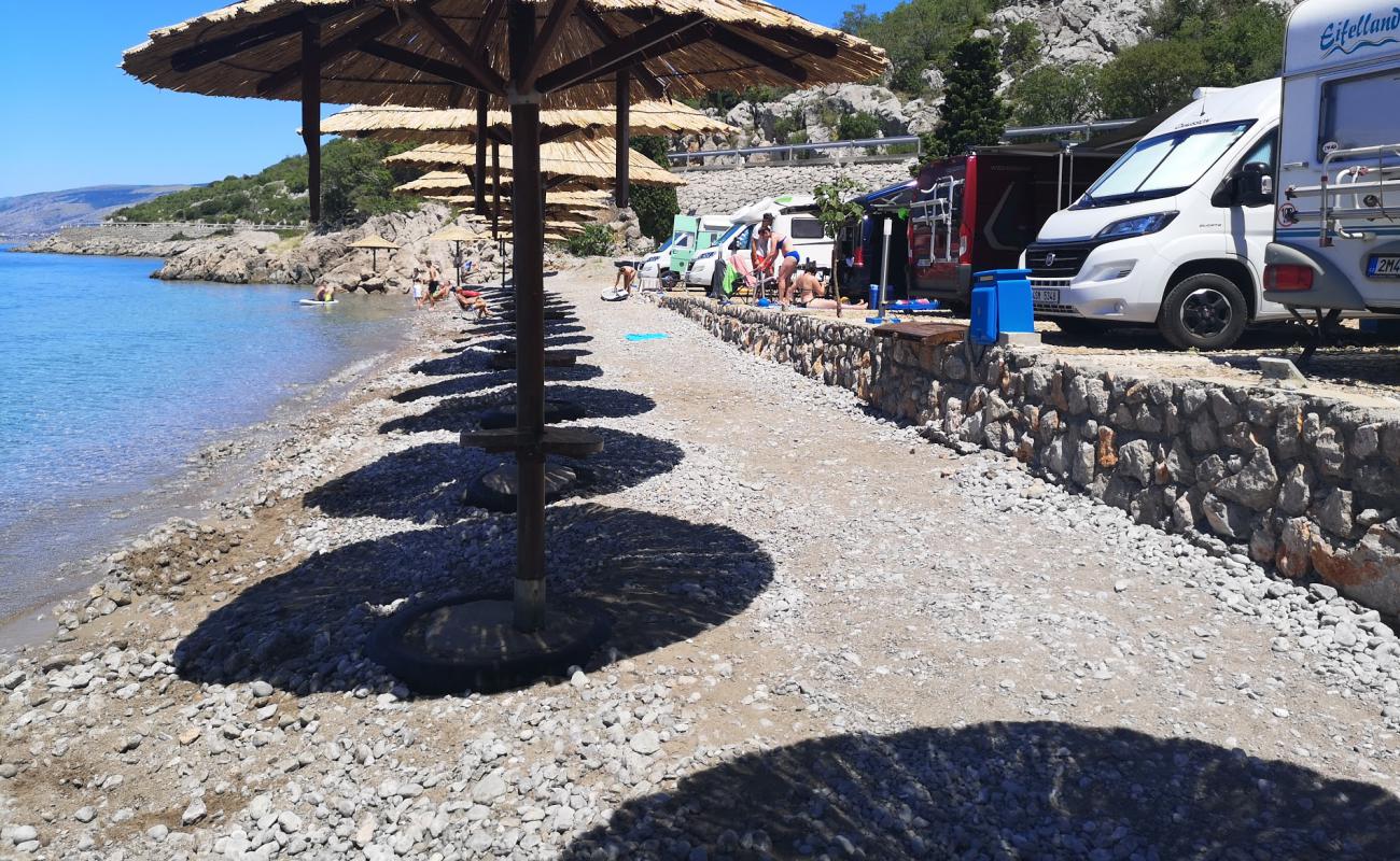 Photo de Plaza Raca avec galets bruns de surface