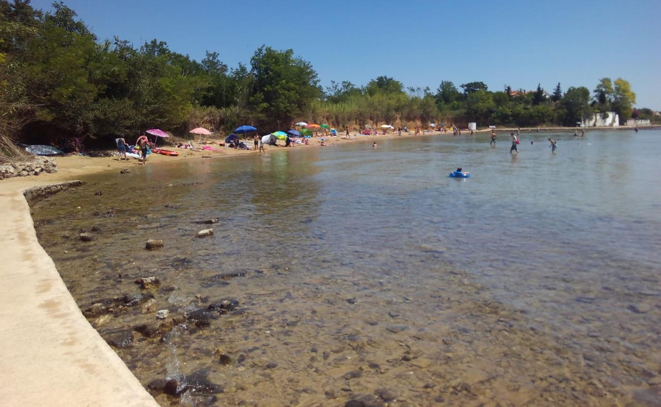 Photo de Mletak beach avec sable lumineux de surface