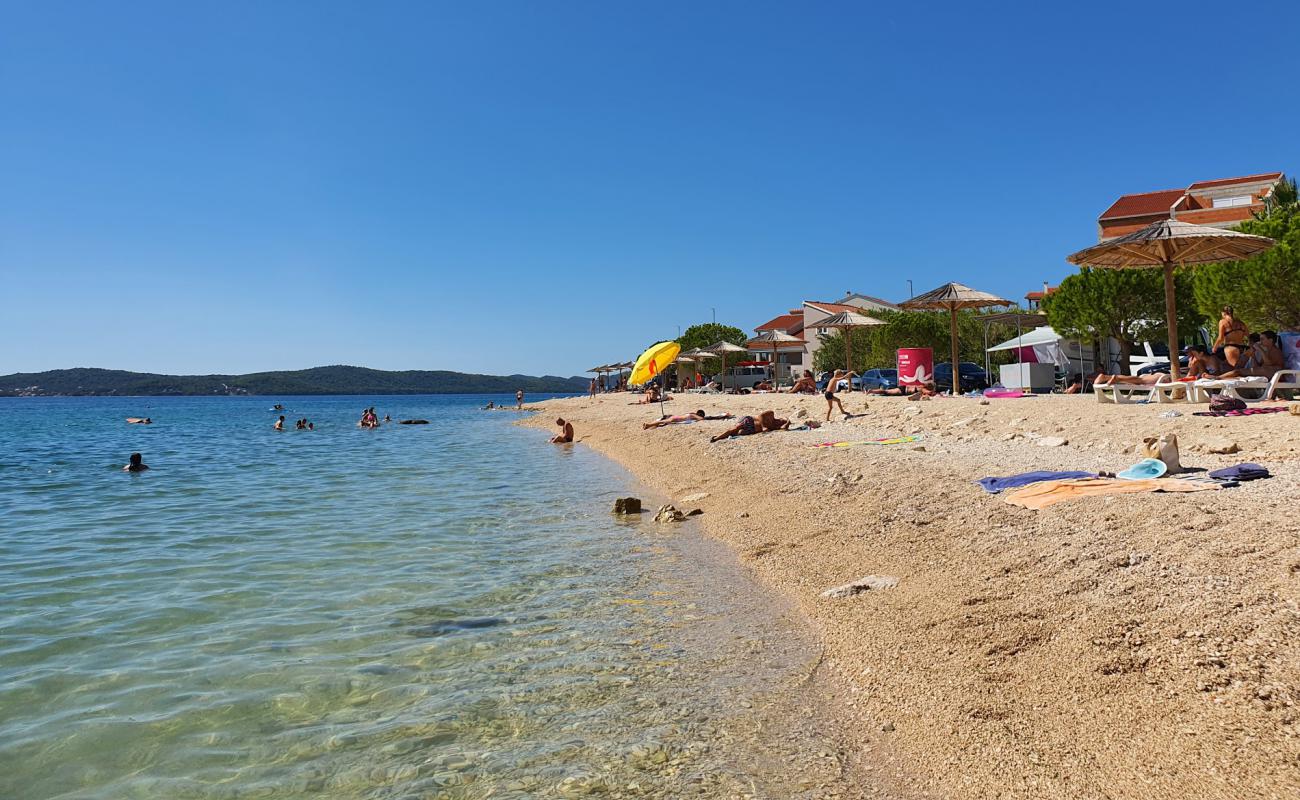 Photo de Punta Bibinje beach avec petits galets beige de surface