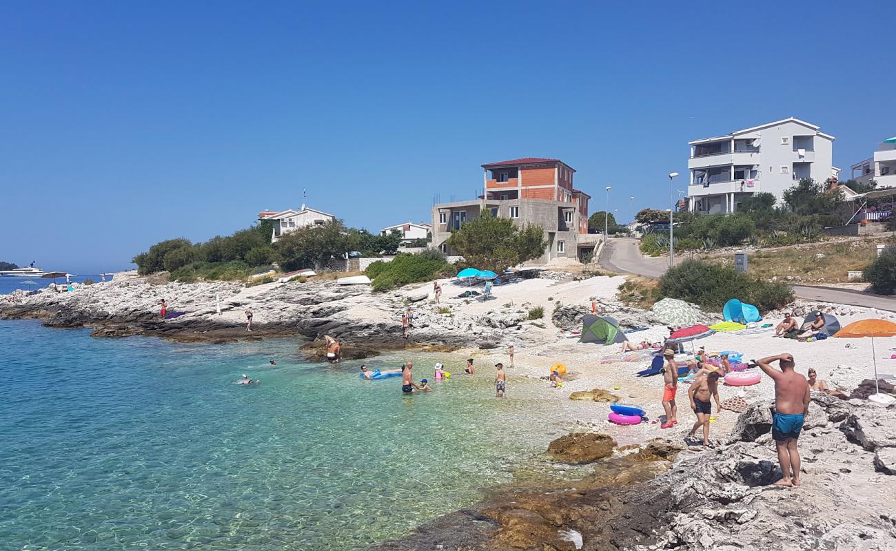 Photo de Zecevo beach avec caillou fin clair de surface