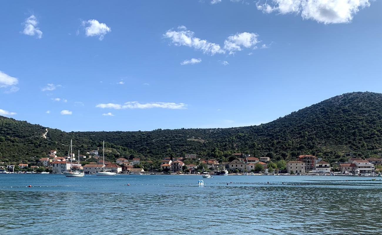 Photo de Zagrada beach avec galets beige de surface