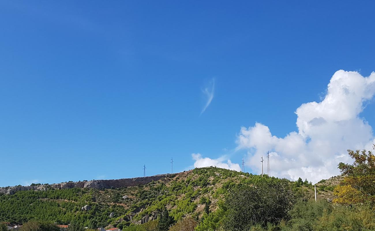 Photo de Plaza Rogac avec sable brun de surface