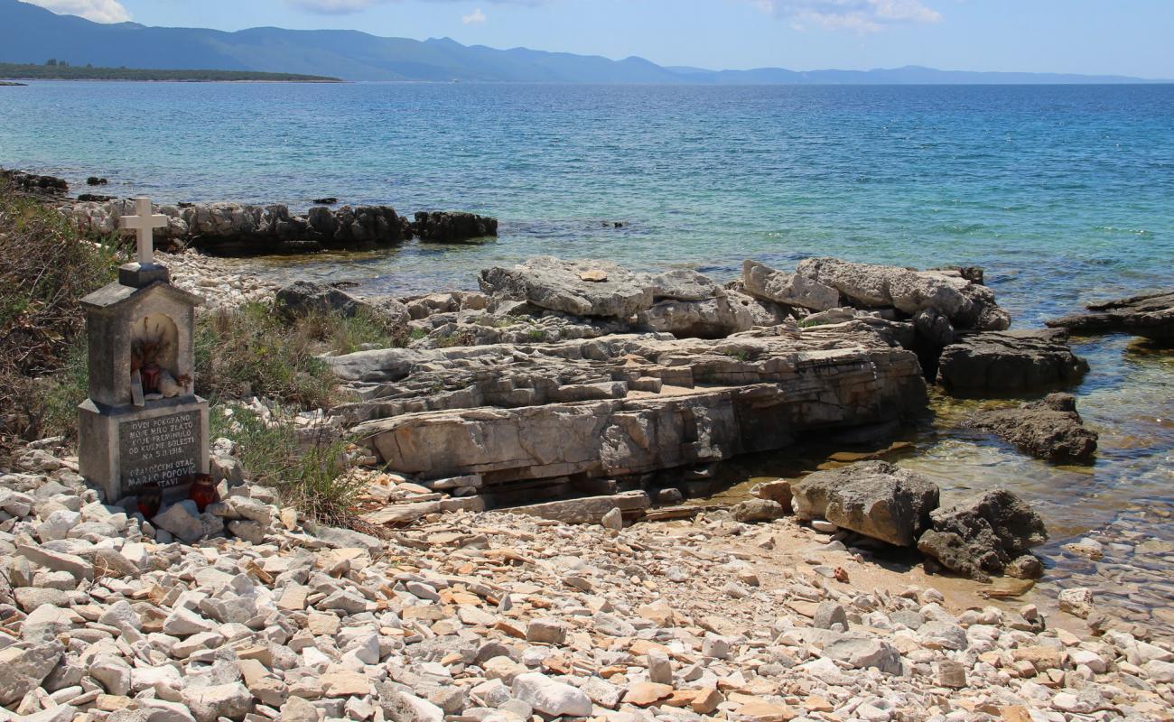 Photo de Denka FKK beach avec roches de surface