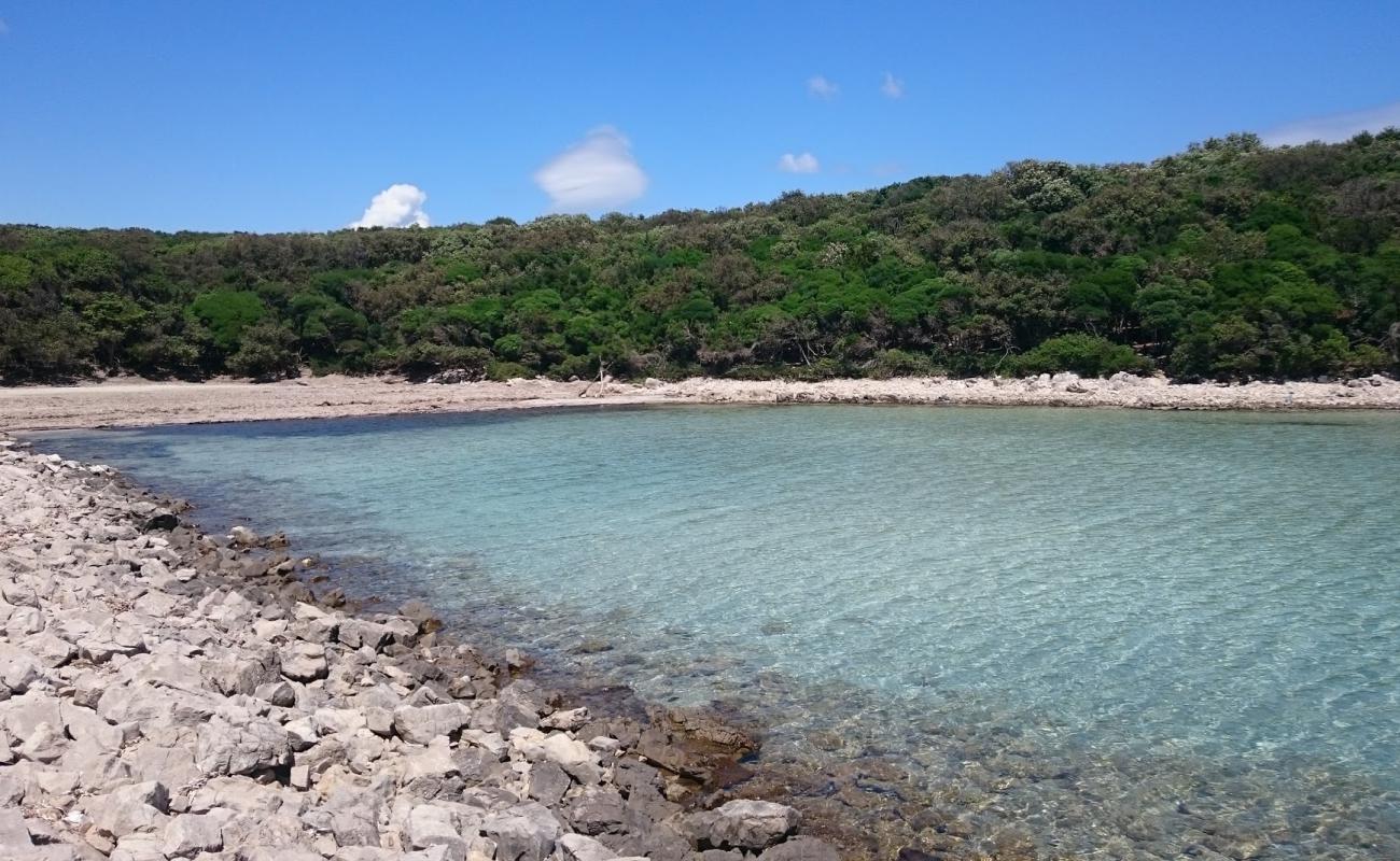 Photo de Uvala Meli avec sable beige fin de surface