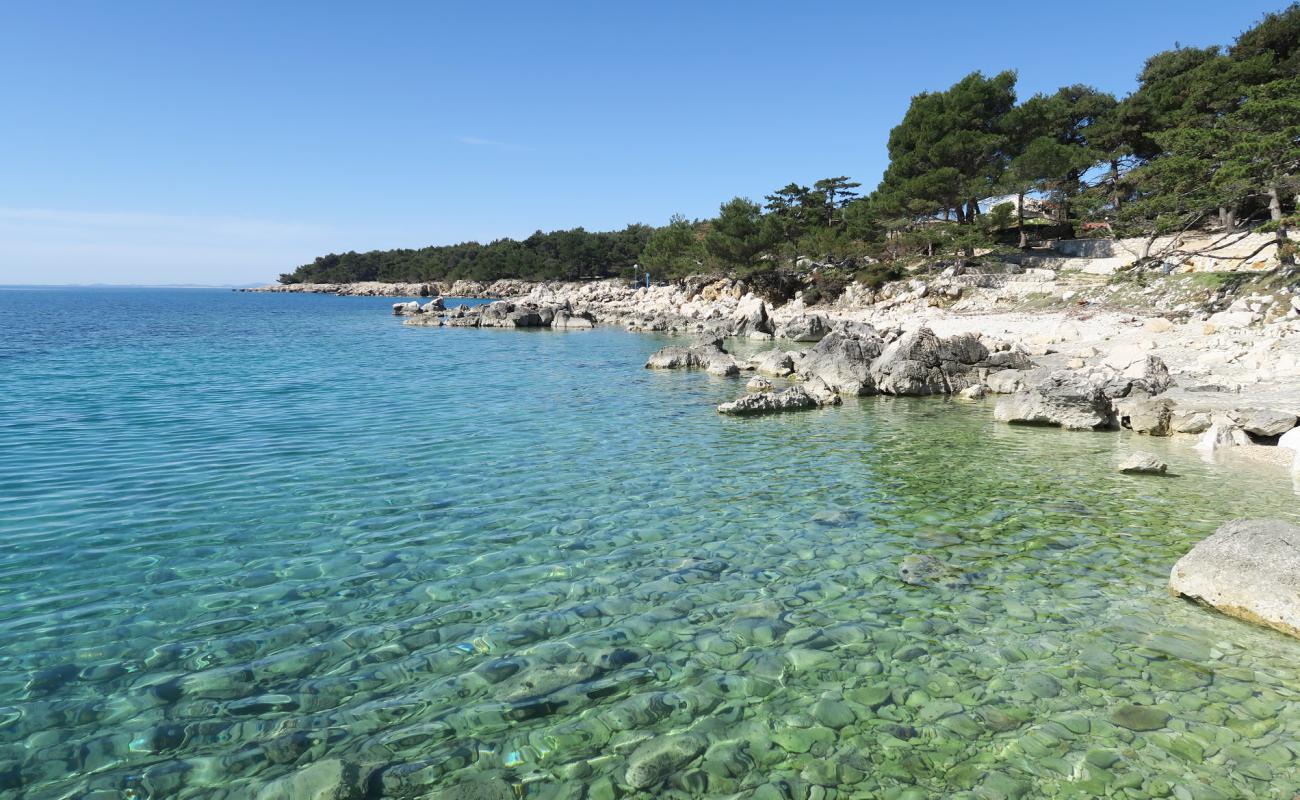 Photo de Kandarola II beach avec roches de surface