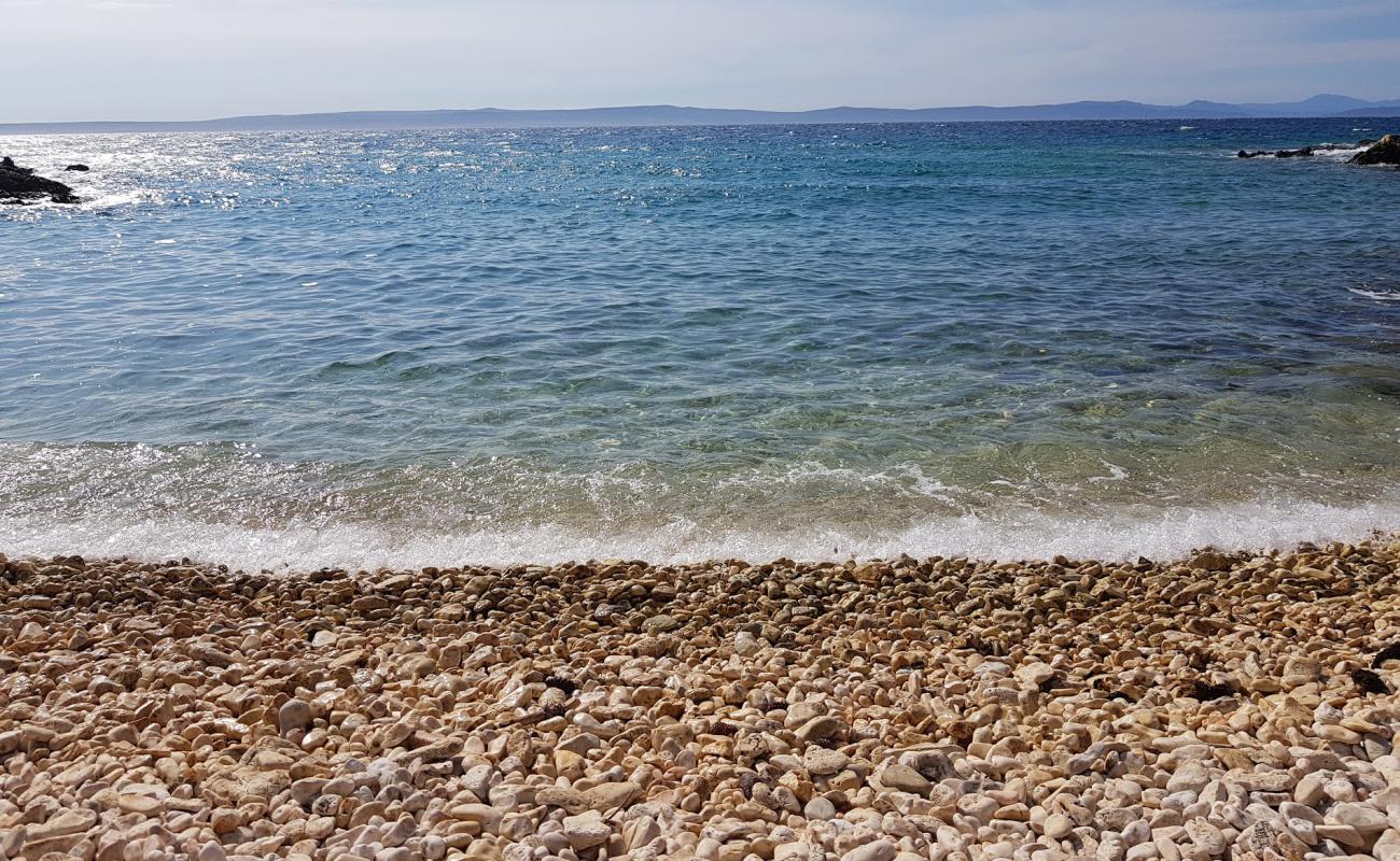 Photo de Kalifront beach avec galets beige de surface
