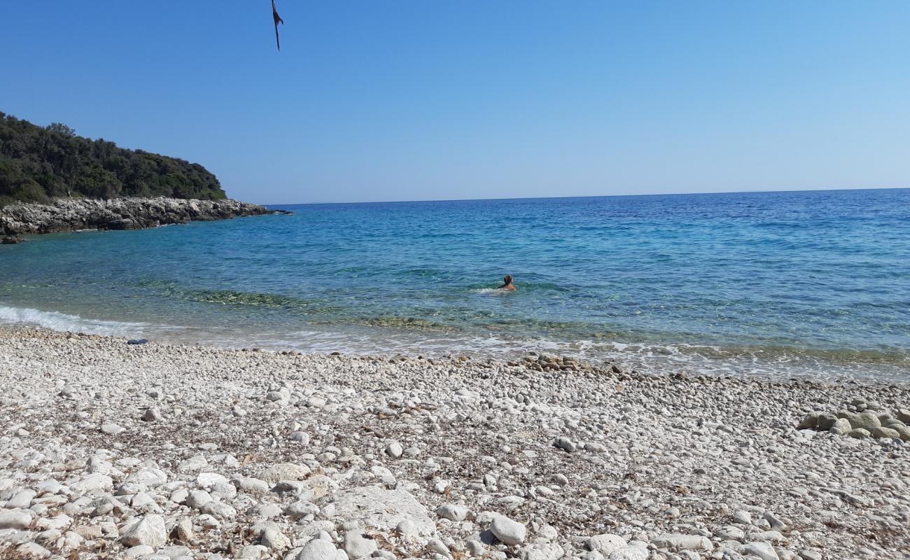 Photo de Portogruaresi beach avec galets beige de surface
