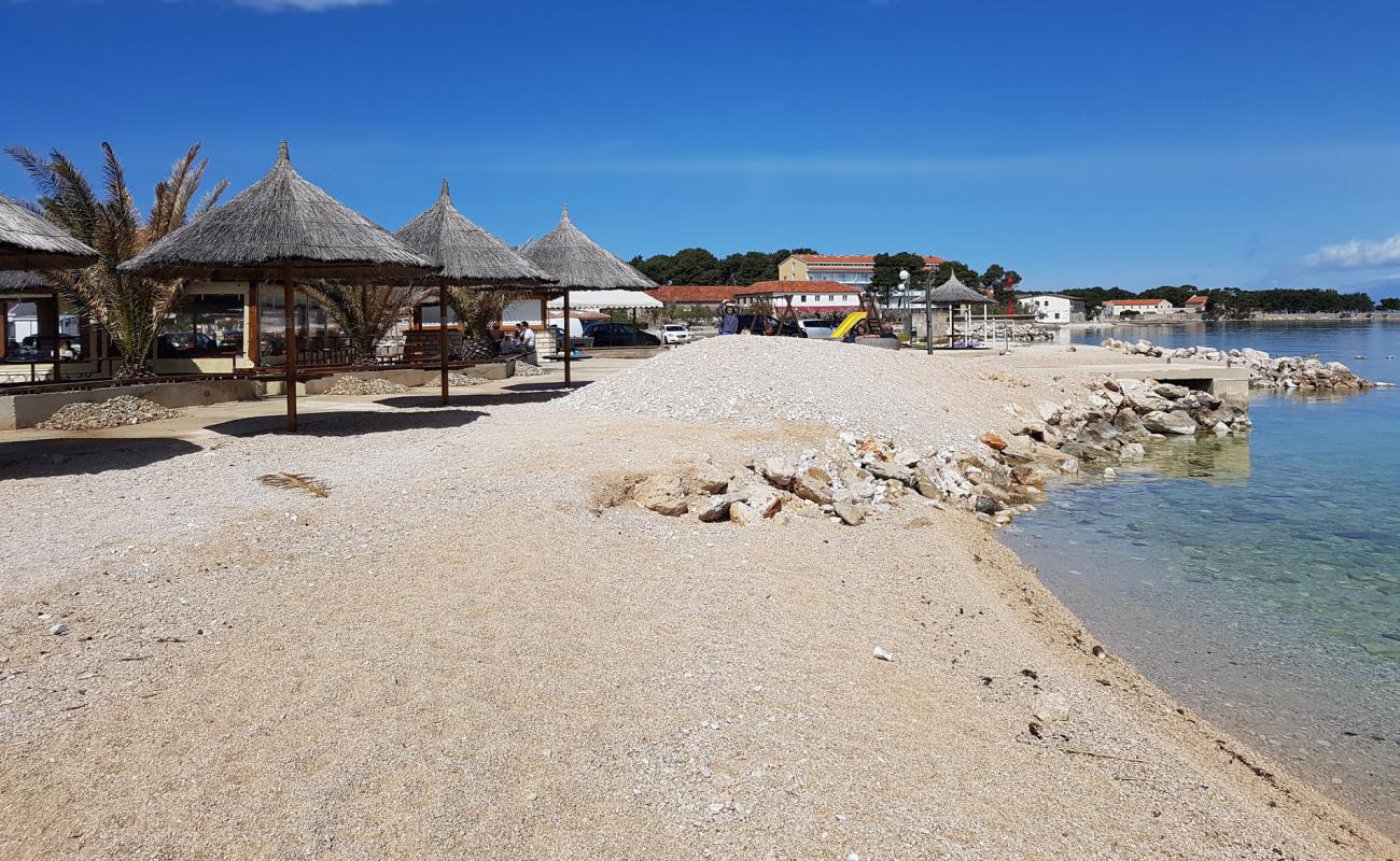 Photo de Ugljan beach avec galets beige de surface