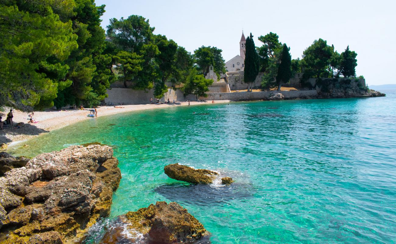 Photo de Bijela Kuca beach avec caillou fin clair de surface