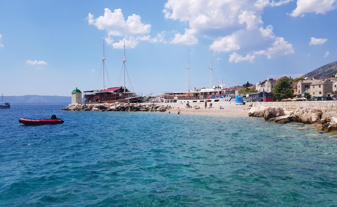 Photo de Port Bol beach avec caillou clair de surface