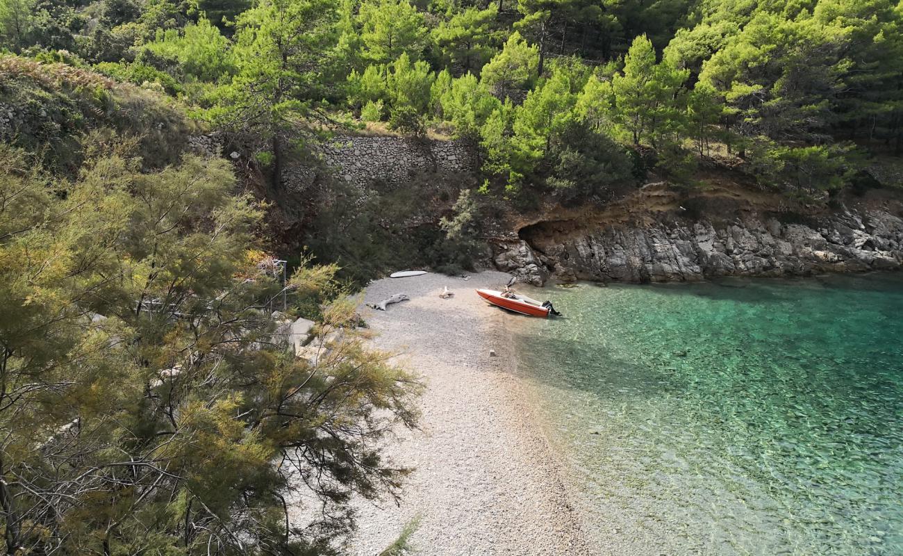 Photo de Didina beach avec caillou clair de surface