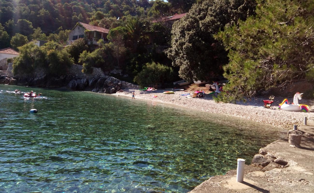 Photo de Rapak beach avec caillou clair de surface