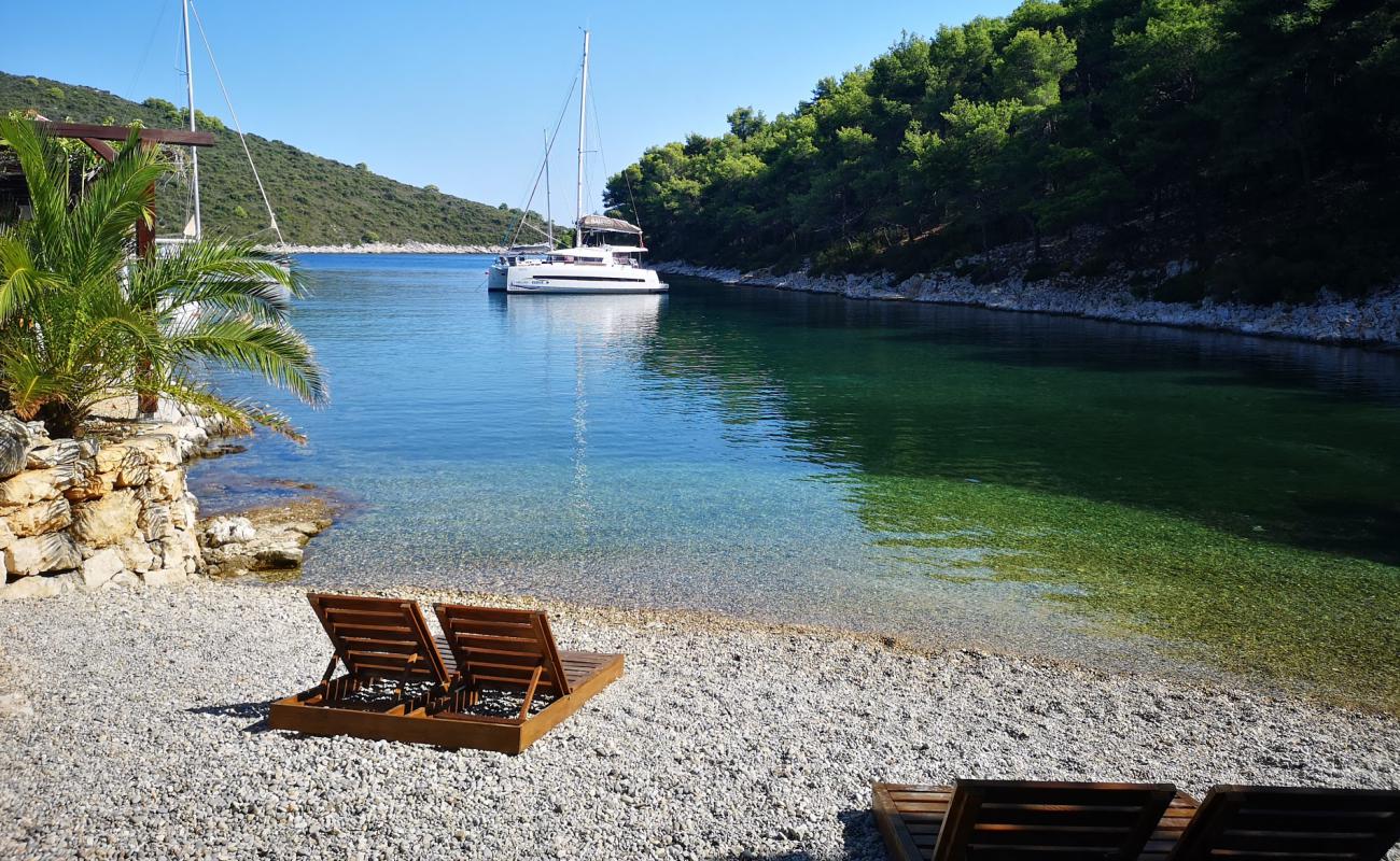 Photo de Calma beach II avec caillou fin gris de surface