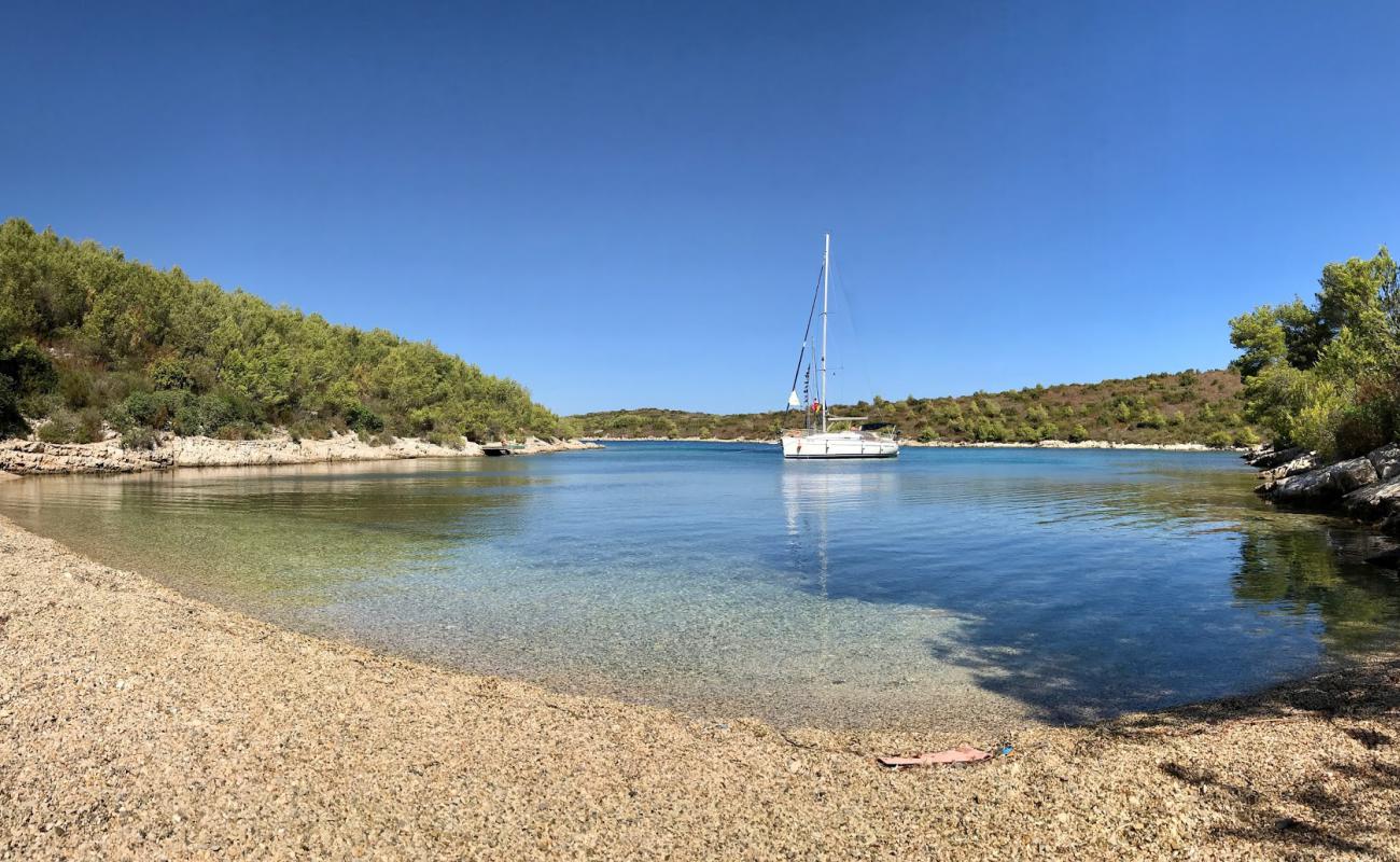 Photo de Dijana beach avec petits galets gris de surface