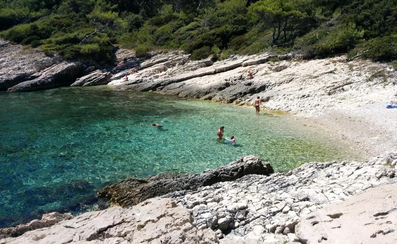 Photo de Jugo beach avec caillou blanc de surface