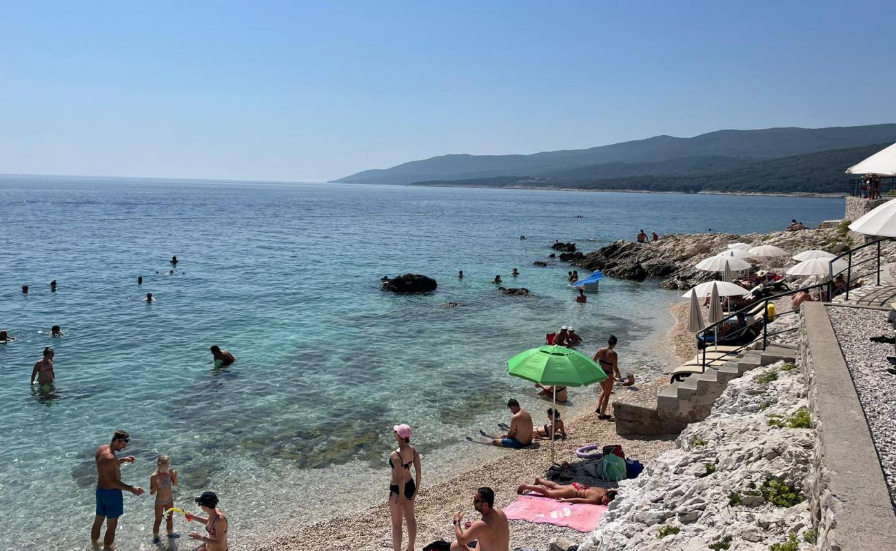 Photo de Lanterna Beach avec caillou clair de surface