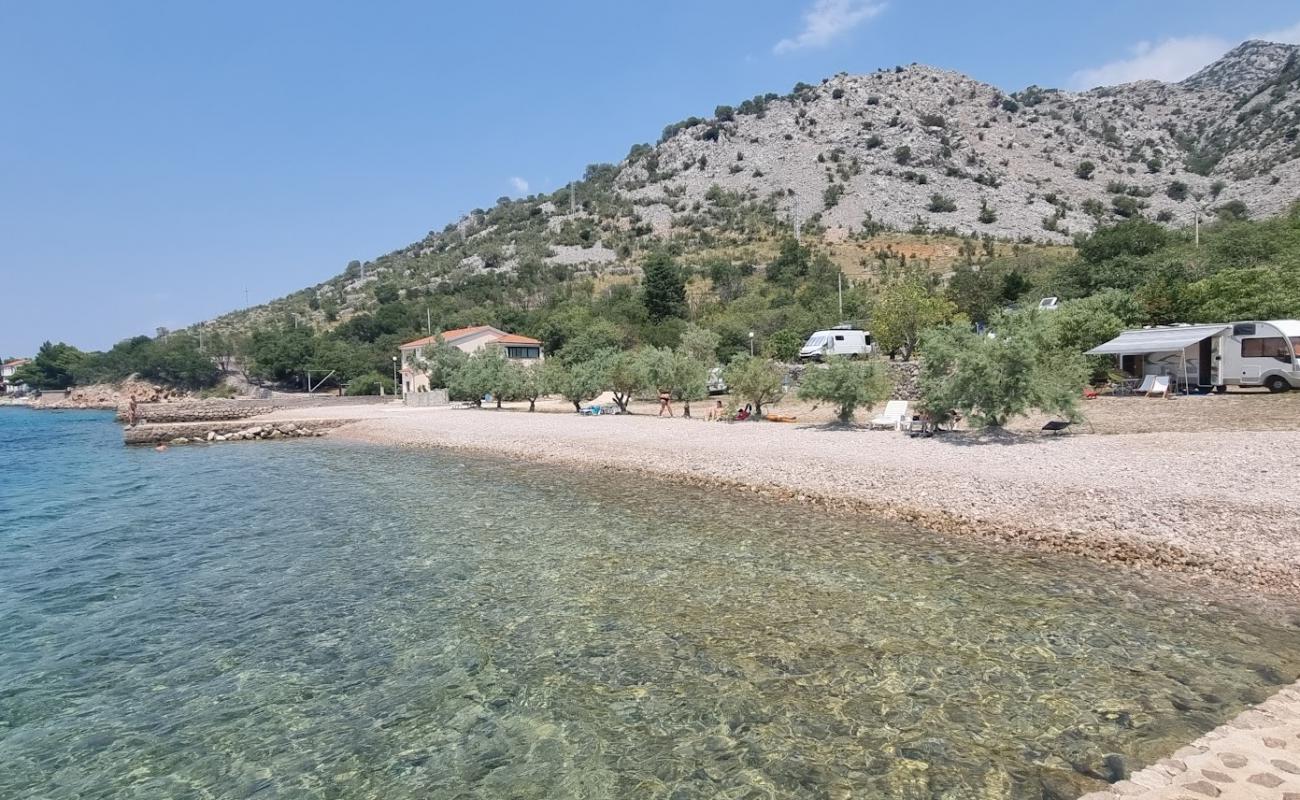 Photo de Zalo Beach avec roches de surface