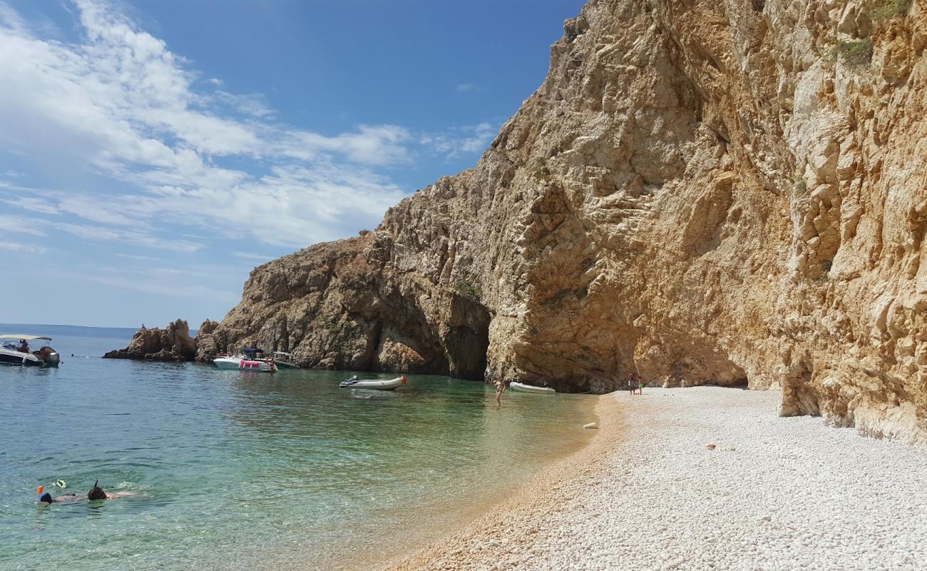 Photo de Golden Bay Beach avec caillou fin clair de surface