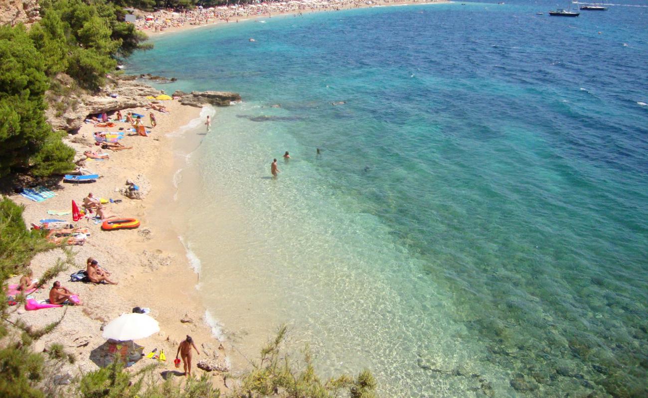 Photo de Paklina FKK Beach avec sable clair avec caillou de surface