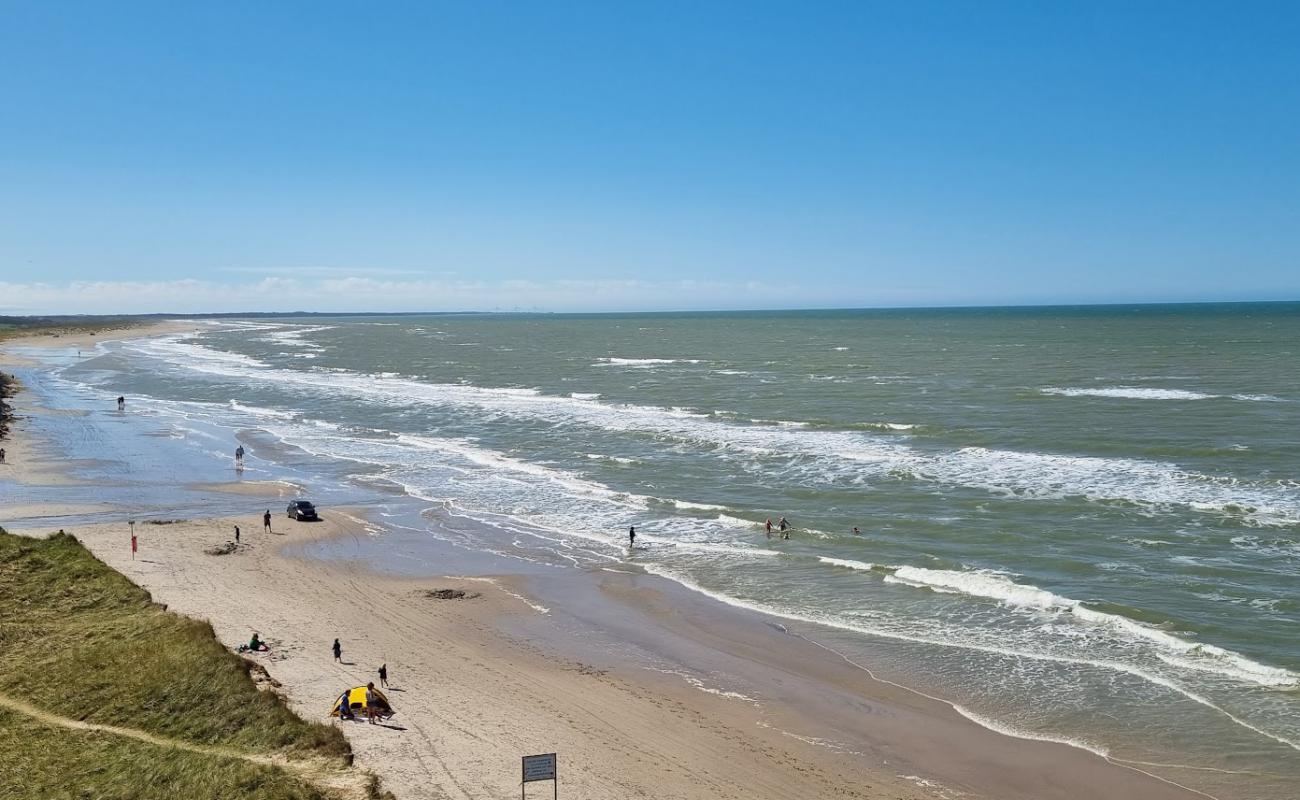 Photo de Skiveren Beach avec sable beige fin de surface