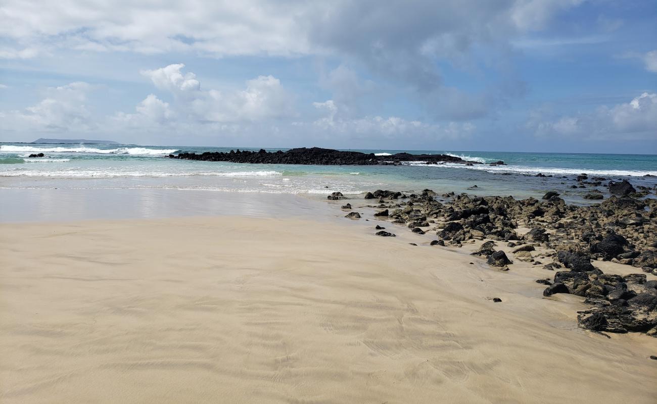 Photo de La Playita avec sable lumineux de surface