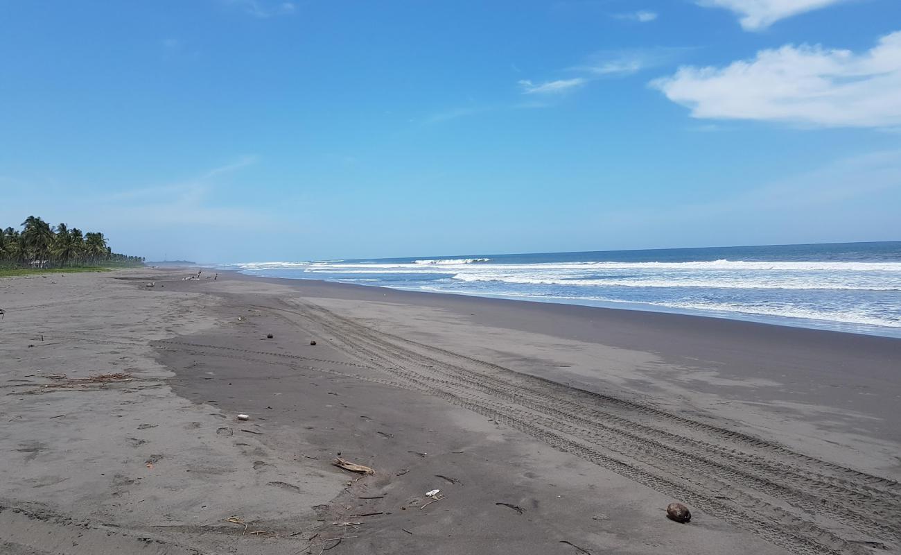 Photo de Garita Palmera beach avec sable brun de surface