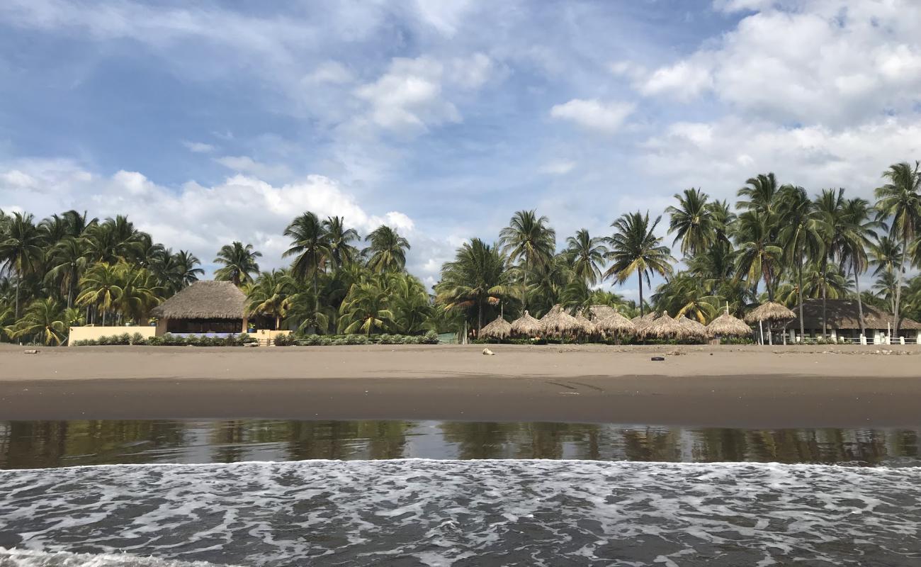 Photo de Costa Azul beach avec sable brun de surface