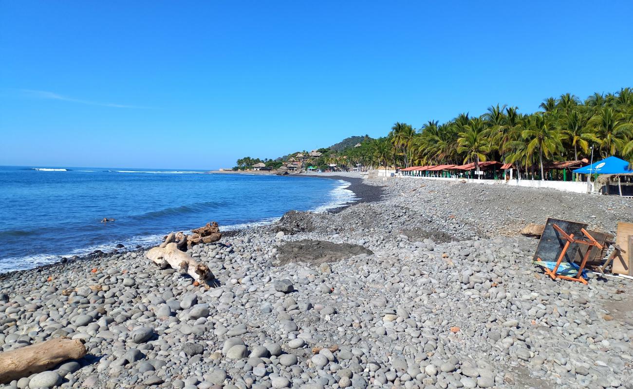 Photo de Playa El Tunco avec sable gris avec caillou de surface