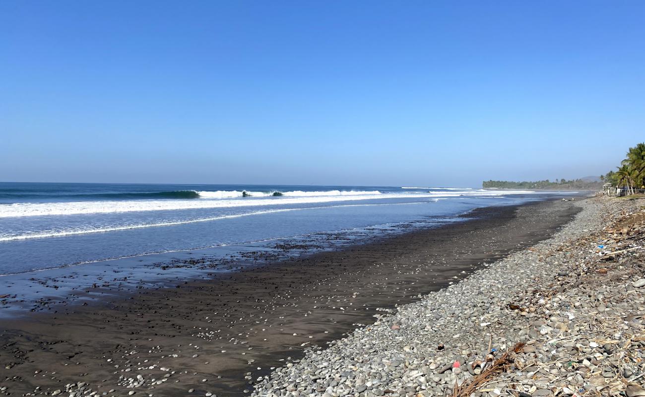 Photo de ASOB Conchalio beach avec sable gris avec caillou de surface