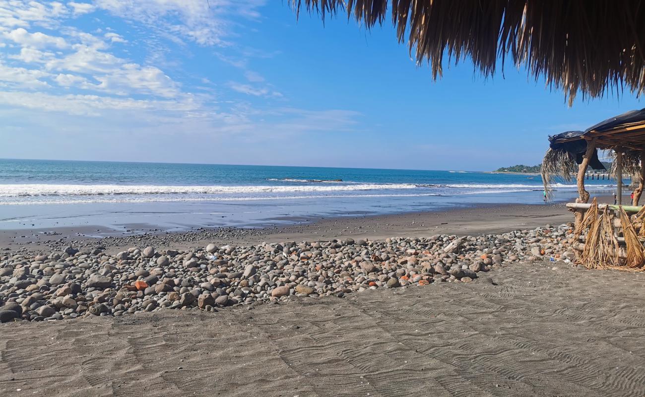 Photo de Obispo beach avec sable gris avec caillou de surface